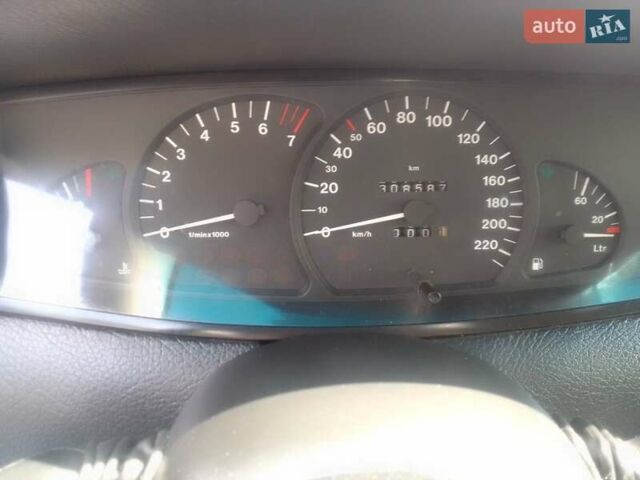 Серый Опель Омега, объемом двигателя 2 л и пробегом 300 тыс. км за 1700 $, фото 9 на Automoto.ua