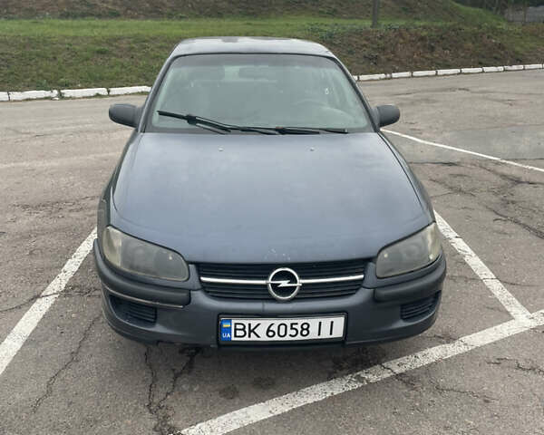 Сірий Опель Омега, об'ємом двигуна 2 л та пробігом 300 тис. км за 1800 $, фото 1 на Automoto.ua