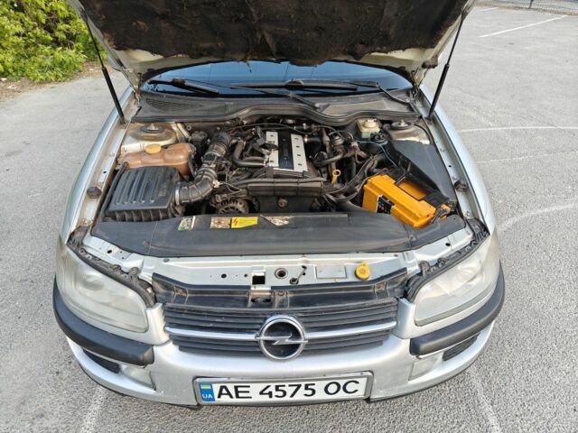 Сірий Опель Омега, об'ємом двигуна 2 л та пробігом 248 тис. км за 2900 $, фото 7 на Automoto.ua