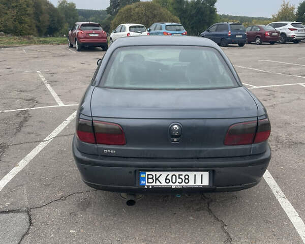Сірий Опель Омега, об'ємом двигуна 2 л та пробігом 300 тис. км за 1800 $, фото 3 на Automoto.ua