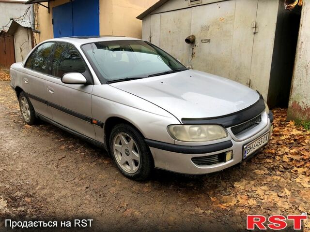 Серый Опель Омега, объемом двигателя 2 л и пробегом 333 тыс. км за 2250 $, фото 1 на Automoto.ua