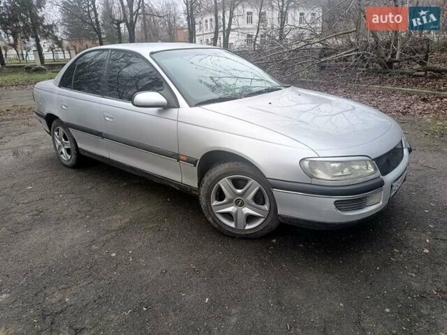 Серый Опель Омега, объемом двигателя 2.5 л и пробегом 398 тыс. км за 2400 $, фото 2 на Automoto.ua