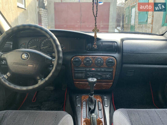 Серый Опель Омега, объемом двигателя 2.5 л и пробегом 383 тыс. км за 3199 $, фото 4 на Automoto.ua