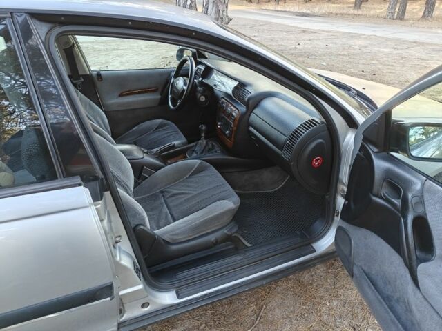 Серый Опель Омега, объемом двигателя 2 л и пробегом 249 тыс. км за 2450 $, фото 12 на Automoto.ua