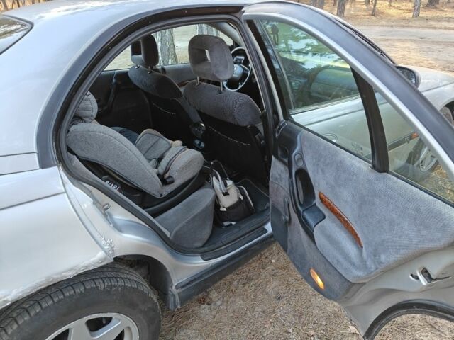 Серый Опель Омега, объемом двигателя 2 л и пробегом 249 тыс. км за 2450 $, фото 4 на Automoto.ua