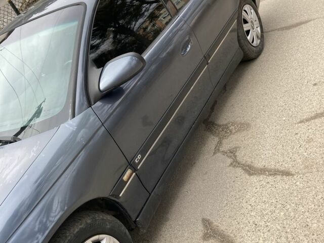 Серый Опель Омега, объемом двигателя 2 л и пробегом 312 тыс. км за 2150 $, фото 2 на Automoto.ua