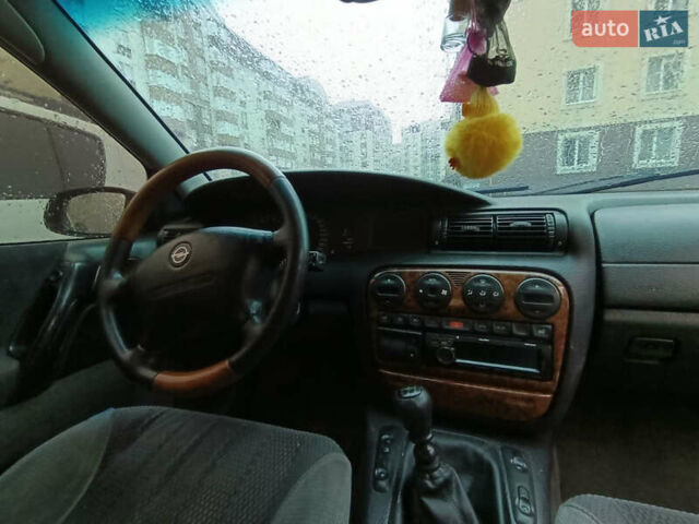 Серый Опель Омега, объемом двигателя 2.5 л и пробегом 364 тыс. км за 1800 $, фото 5 на Automoto.ua