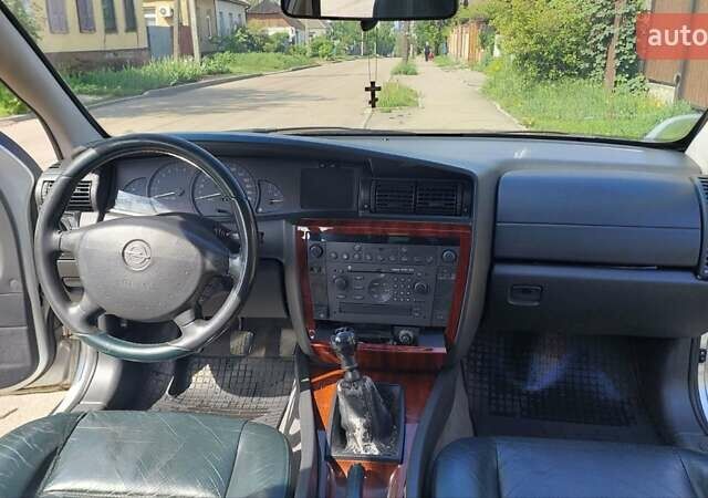 Серый Опель Омега, объемом двигателя 2 л и пробегом 275 тыс. км за 3500 $, фото 18 на Automoto.ua