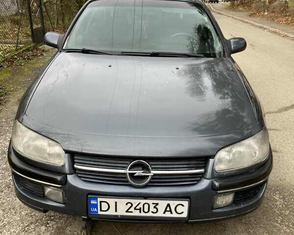 Серый Опель Омега, объемом двигателя 2 л и пробегом 312 тыс. км за 2150 $, фото 1 на Automoto.ua