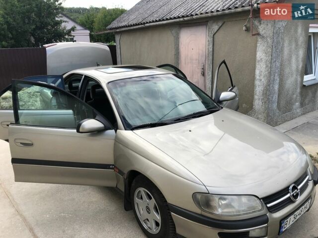 Сірий Опель Омега, об'ємом двигуна 2 л та пробігом 228 тис. км за 3000 $, фото 4 на Automoto.ua