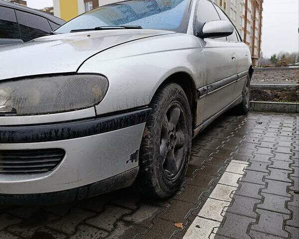 Серый Опель Омега, объемом двигателя 2.5 л и пробегом 364 тыс. км за 1800 $, фото 3 на Automoto.ua