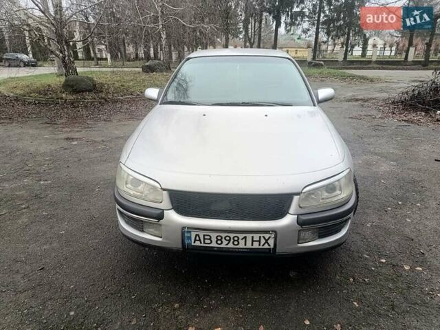 Серый Опель Омега, объемом двигателя 2.5 л и пробегом 398 тыс. км за 2400 $, фото 1 на Automoto.ua