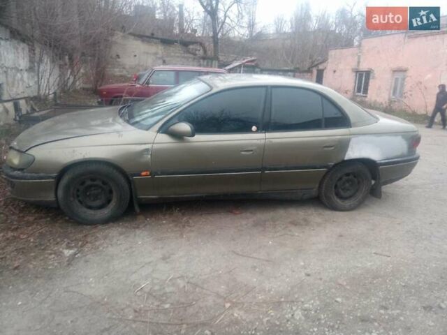 Серый Опель Омега, объемом двигателя 2 л и пробегом 300 тыс. км за 1500 $, фото 1 на Automoto.ua