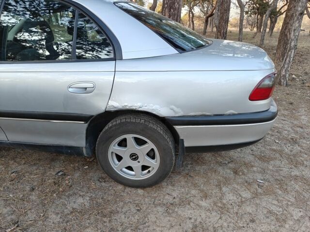 Серый Опель Омега, объемом двигателя 2 л и пробегом 249 тыс. км за 2450 $, фото 5 на Automoto.ua