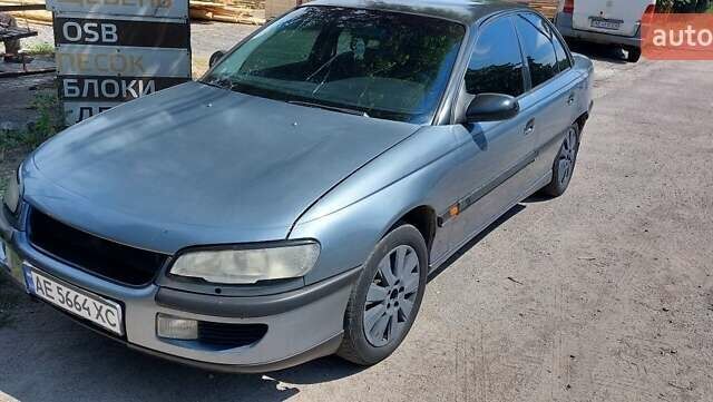 Сірий Опель Омега, об'ємом двигуна 3 л та пробігом 350 тис. км за 2000 $, фото 1 на Automoto.ua