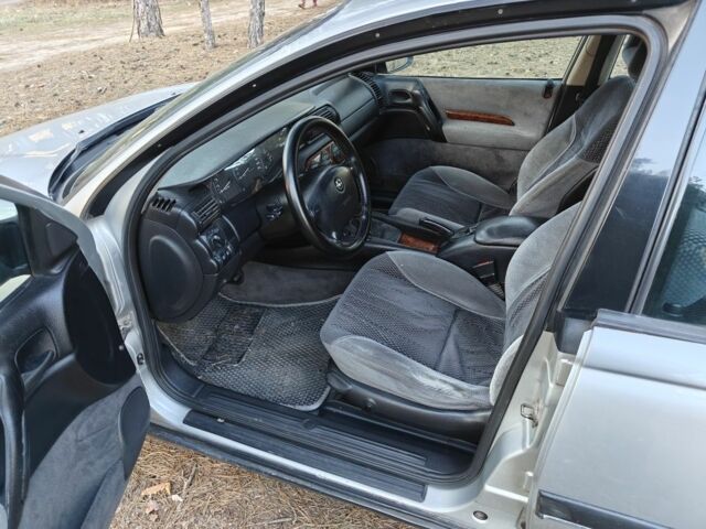 Серый Опель Омега, объемом двигателя 2 л и пробегом 249 тыс. км за 2450 $, фото 1 на Automoto.ua