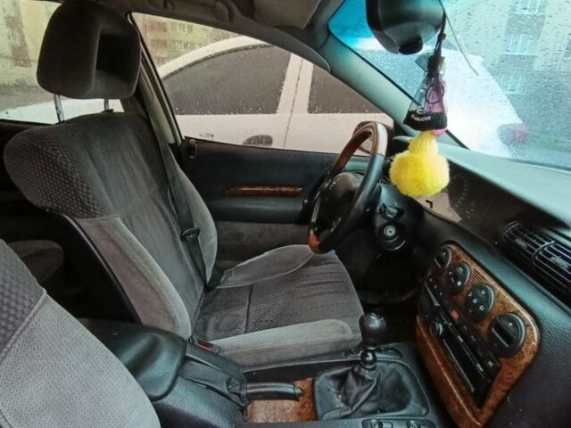 Серый Опель Омега, объемом двигателя 2.5 л и пробегом 364 тыс. км за 1500 $, фото 4 на Automoto.ua