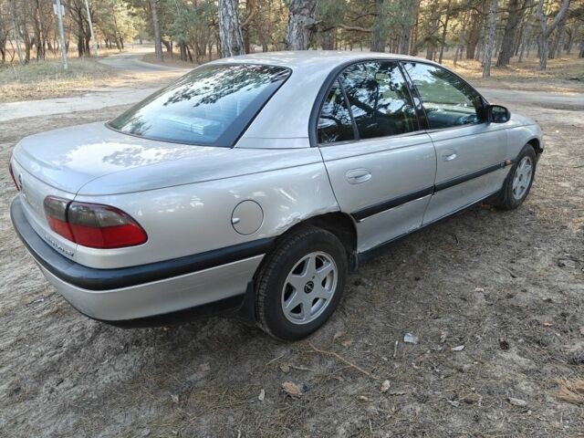 Серый Опель Омега, объемом двигателя 2 л и пробегом 249 тыс. км за 2450 $, фото 8 на Automoto.ua