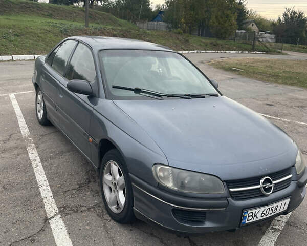 Сірий Опель Омега, об'ємом двигуна 2 л та пробігом 300 тис. км за 1800 $, фото 2 на Automoto.ua