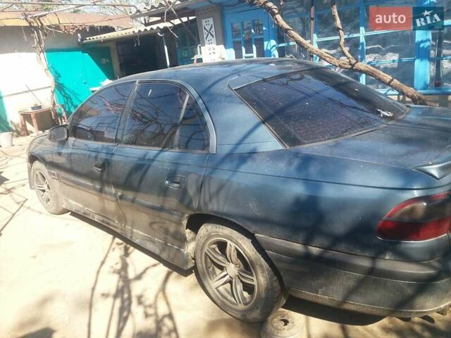 Сірий Опель Омега, об'ємом двигуна 2.5 л та пробігом 320 тис. км за 2700 $, фото 3 на Automoto.ua