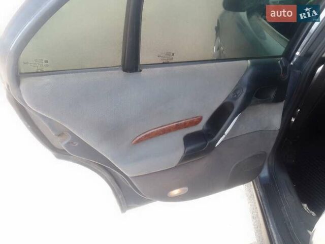 Серый Опель Омега, объемом двигателя 2 л и пробегом 300 тыс. км за 1700 $, фото 11 на Automoto.ua