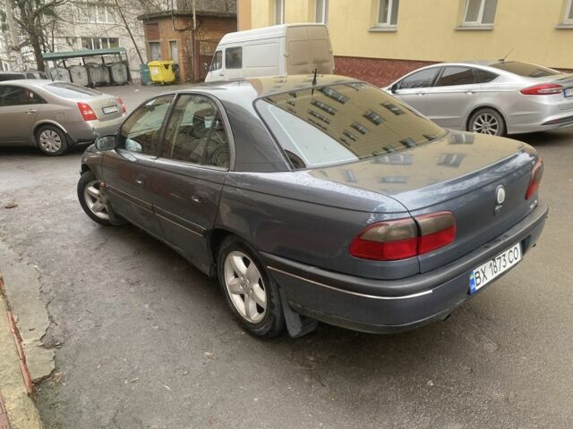 Сірий Опель Омега, об'ємом двигуна 2.5 л та пробігом 283 тис. км за 1300 $, фото 2 на Automoto.ua