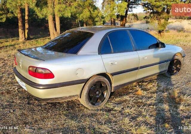 Сірий Опель Омега, об'ємом двигуна 2 л та пробігом 362 тис. км за 2450 $, фото 39 на Automoto.ua