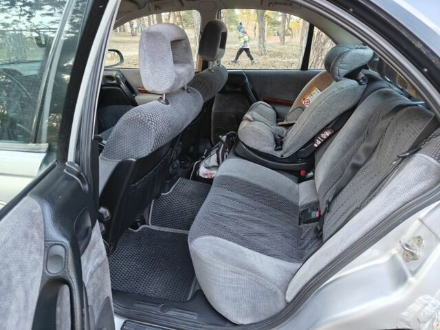 Серый Опель Омега, объемом двигателя 2 л и пробегом 249 тыс. км за 2450 $, фото 2 на Automoto.ua