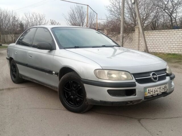 Сірий Опель Омега, об'ємом двигуна 2 л та пробігом 380 тис. км за 900 $, фото 1 на Automoto.ua