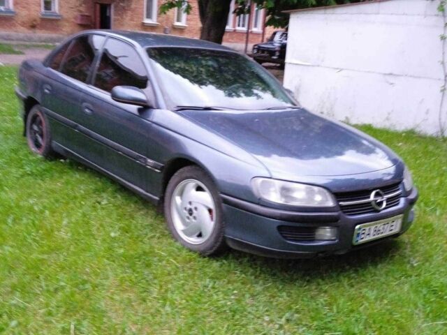 Серый Опель Омега, объемом двигателя 0.25 л и пробегом 349 тыс. км за 2500 $, фото 1 на Automoto.ua