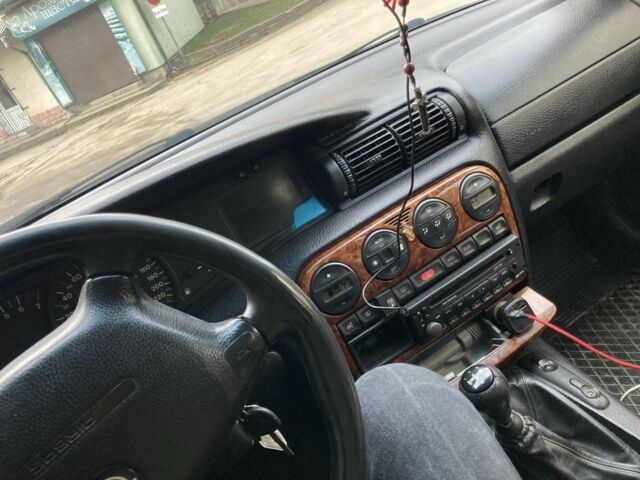 Серый Опель Омега, объемом двигателя 2 л и пробегом 312 тыс. км за 2150 $, фото 4 на Automoto.ua