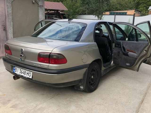 Сірий Опель Омега, об'ємом двигуна 2 л та пробігом 228 тис. км за 3000 $, фото 3 на Automoto.ua