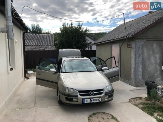 Сірий Опель Омега, об'ємом двигуна 2 л та пробігом 228 тис. км за 3000 $, фото 5 на Automoto.ua