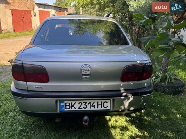 Серый Опель Омега, объемом двигателя 2.5 л и пробегом 310 тыс. км за 4200 $, фото 7 на Automoto.ua