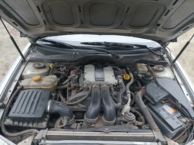 Серый Опель Омега, объемом двигателя 2.5 л и пробегом 230 тыс. км за 2000 $, фото 7 на Automoto.ua