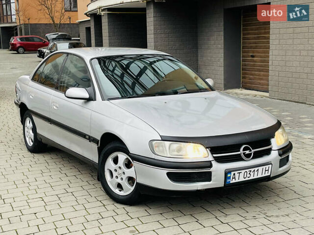 Серый Опель Омега, объемом двигателя 2 л и пробегом 380 тыс. км за 1450 $, фото 2 на Automoto.ua