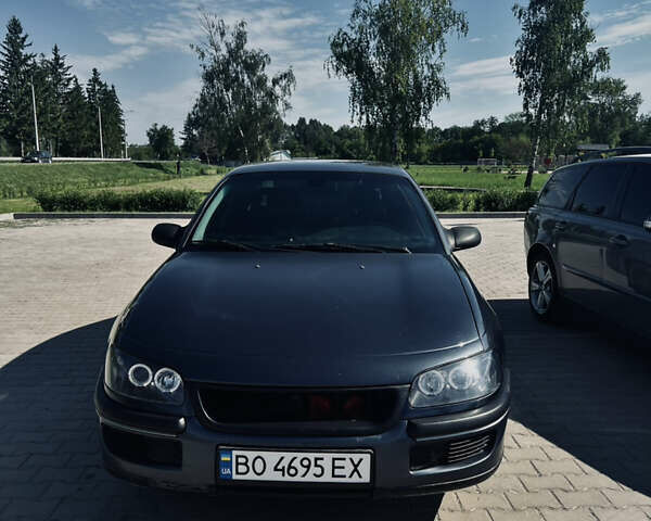 Серый Опель Омега, объемом двигателя 2 л и пробегом 290 тыс. км за 2600 $, фото 3 на Automoto.ua