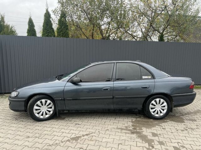 Серый Опель Омега, объемом двигателя 2 л и пробегом 280 тыс. км за 2400 $, фото 1 на Automoto.ua