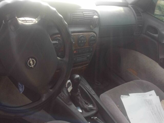 Серый Опель Омега, объемом двигателя 2 л и пробегом 400 тыс. км за 596 $, фото 4 на Automoto.ua