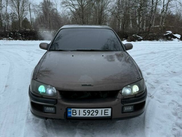 Серый Опель Омега, объемом двигателя 3 л и пробегом 240 тыс. км за 1150 $, фото 6 на Automoto.ua