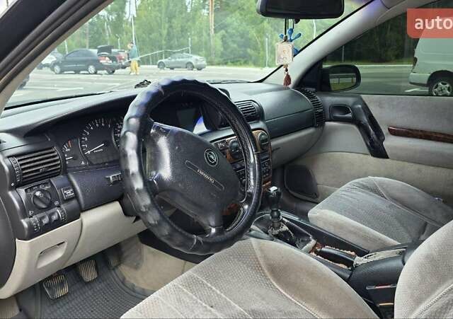 Сірий Опель Омега, об'ємом двигуна 2 л та пробігом 287 тис. км за 2200 $, фото 5 на Automoto.ua