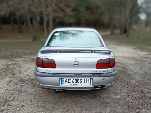Серый Опель Омега, объемом двигателя 2.5 л и пробегом 230 тыс. км за 2000 $, фото 2 на Automoto.ua