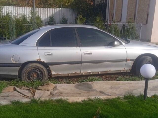 Серый Опель Омега, объемом двигателя 2 л и пробегом 400 тыс. км за 596 $, фото 8 на Automoto.ua