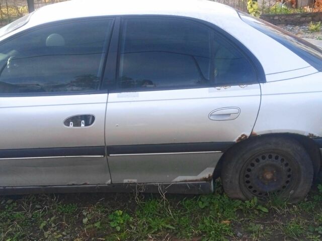 Серый Опель Омега, объемом двигателя 2 л и пробегом 400 тыс. км за 596 $, фото 11 на Automoto.ua