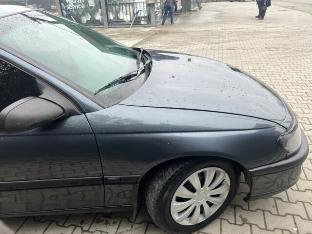 Серый Опель Омега, объемом двигателя 2 л и пробегом 280 тыс. км за 2400 $, фото 4 на Automoto.ua