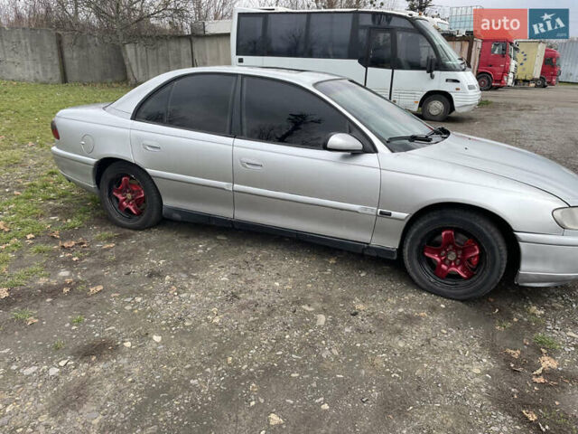 Серый Опель Омега, объемом двигателя 2 л и пробегом 473 тыс. км за 2500 $, фото 4 на Automoto.ua