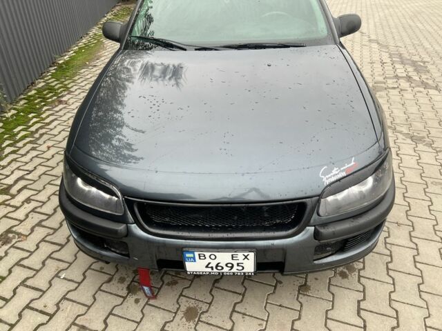 Серый Опель Омега, объемом двигателя 2 л и пробегом 280 тыс. км за 2400 $, фото 5 на Automoto.ua