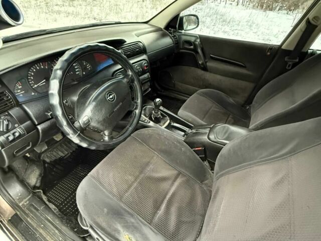 Серый Опель Омега, объемом двигателя 3 л и пробегом 240 тыс. км за 1150 $, фото 4 на Automoto.ua