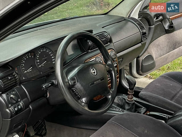 Серый Опель Омега, объемом двигателя 2 л и пробегом 380 тыс. км за 1450 $, фото 11 на Automoto.ua