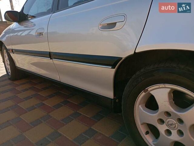 Сірий Опель Омега, об'ємом двигуна 2.5 л та пробігом 165 тис. км за 4000 $, фото 13 на Automoto.ua
